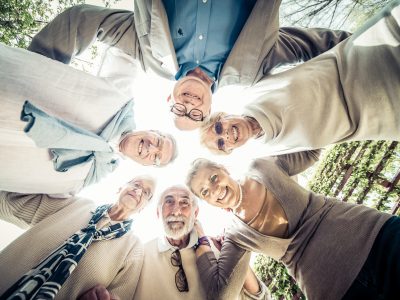 Group of senior people meeting outdoors - Old friends meeting outdoors